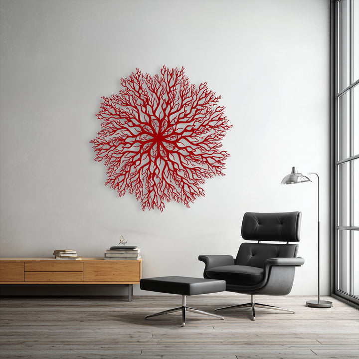 The visual rhythm of the branching red tree roots mandala, a unique metal wall art, forms a captivating nature circle decor on a pristine white wall.