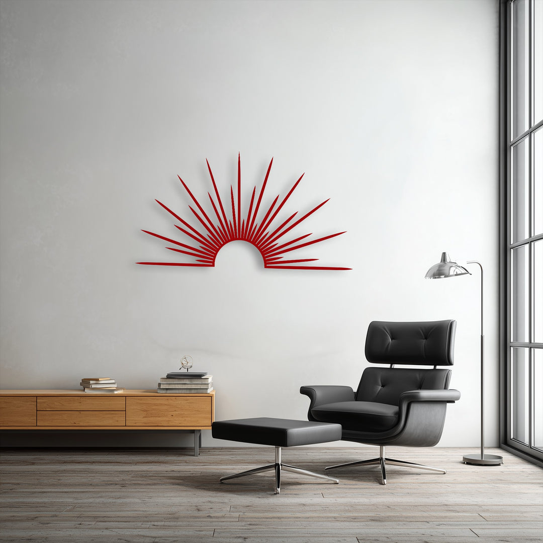 The realistic detail captures the vibrant red sunburst unique metal wall art with striking shadows on a textured wall.