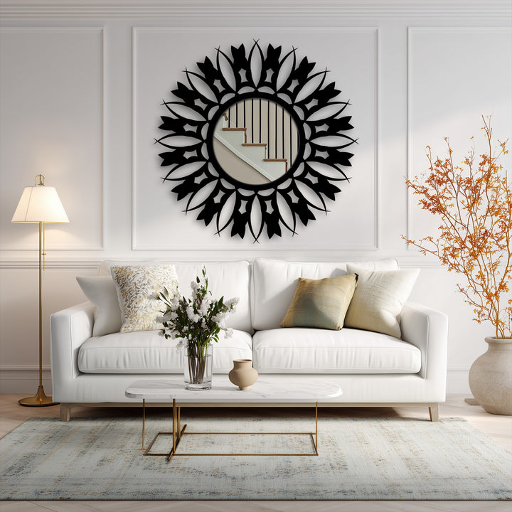 Smooth, black-painted surface provides an intriguing surface texture to this floral sunburst floor mirror's metal frame, offering an artistic touch to home decor.