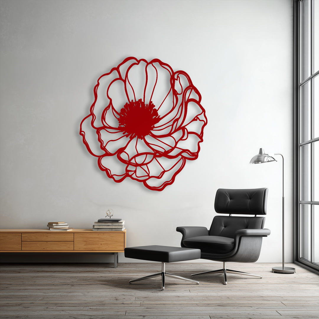 The sophisticated and tranquil mood of a modern living area is beautifully articulated by a striking red floral metal wall decor.