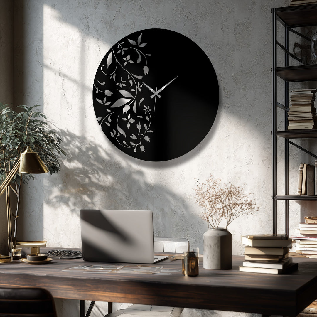 Subtle light and shadow play across the wall around this floral elegance metal wall clock, a striking decoration wall art piece featuring a minimal leaf design.
