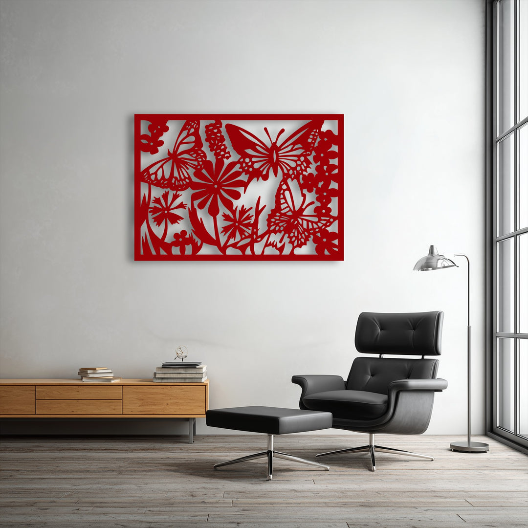 The realistic detail of the intricate red butterfly garden metal wall decor showcases delicate floral nature silhouettes against a bright wall.