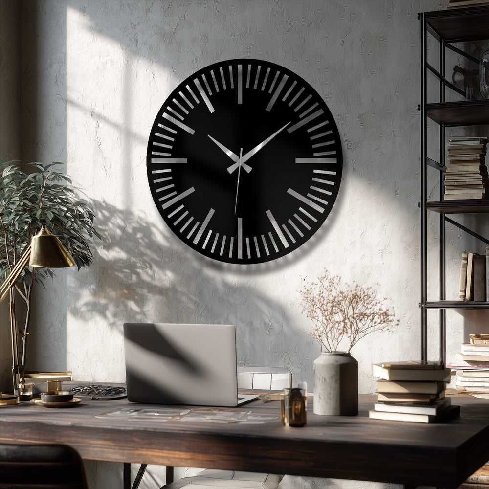 Black dominates this modern minimalist statement wall clock, a luxury metal artwork with a sleek dial featuring silver hands and markers.
