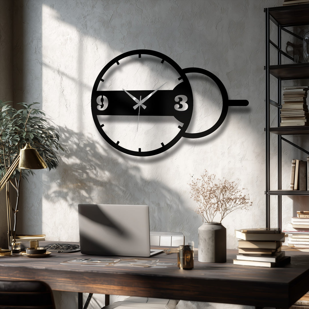 Overlapping circles in this unique metal wall art clock create dynamic depth and layers with 3 and 9 numerals casting shadows in a contemporary design.