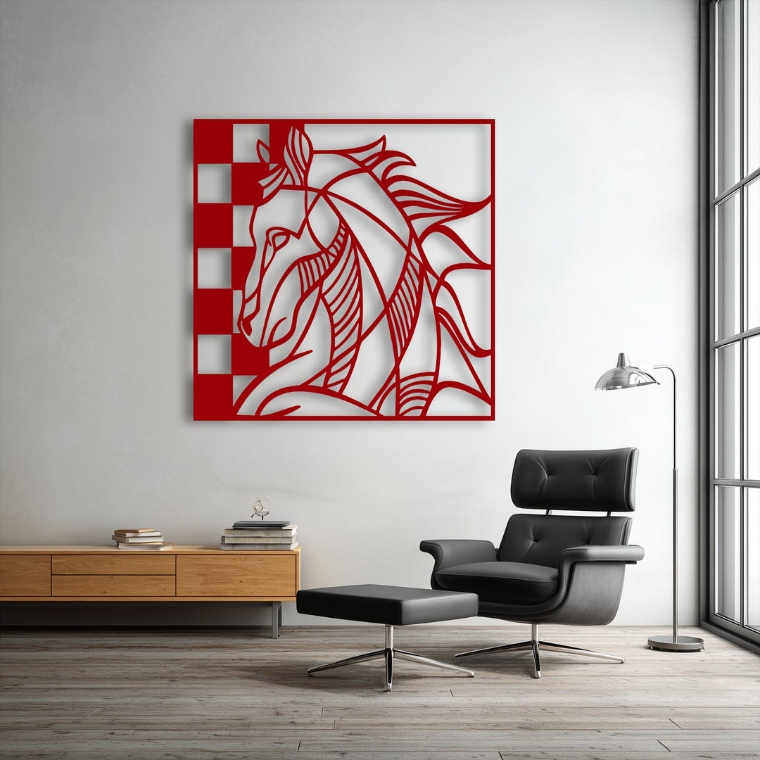 A stylish black leather armchair and matching ottoman sit on a light wooden floor, complementing a modern red horse decorative metal art.