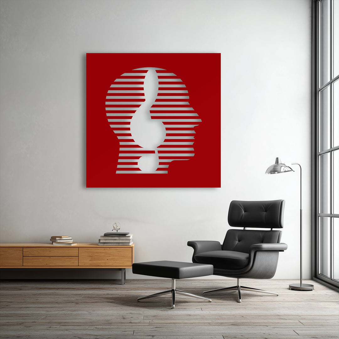 The realistic detail of this metal decoration wall art shows a striped head silhouette and exclamation mark on a bold red background.