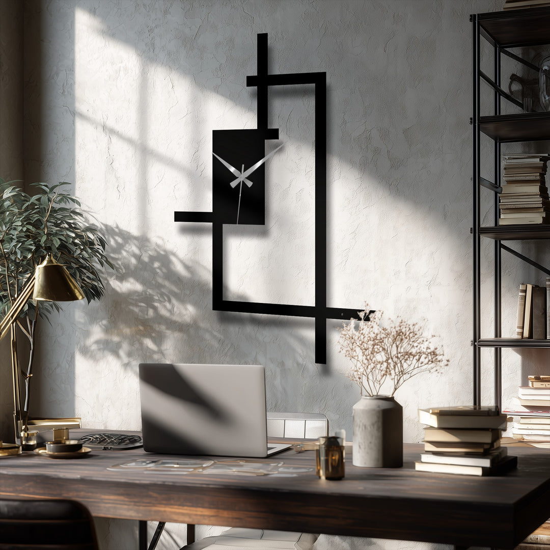 Layering in the abstract line frame enhances this modern metal wall clock, offering depth to this piece of decorative metal art.