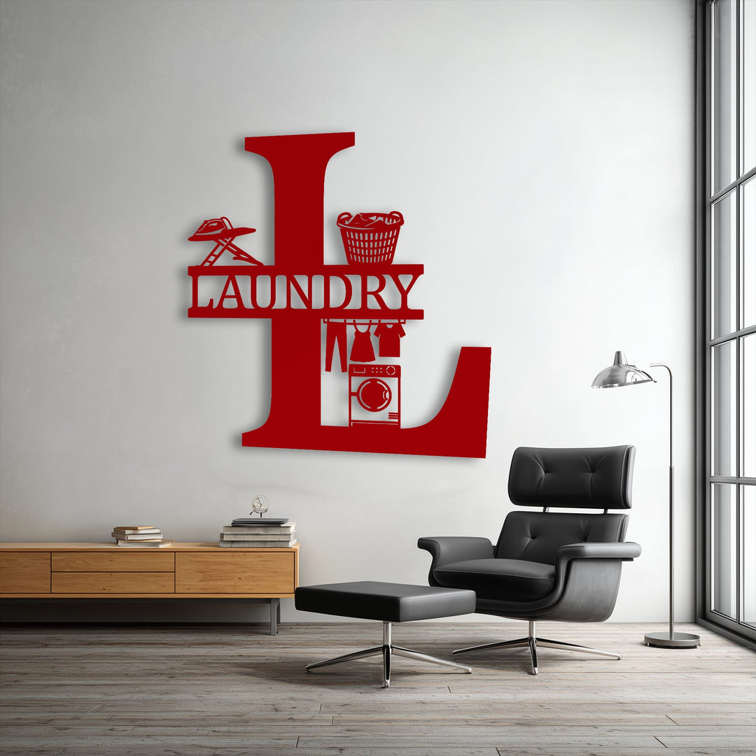 Negative space of the white wall defines a bold red 'L' custom initial unique metal wall art, revealing detailed laundry designs within its form.