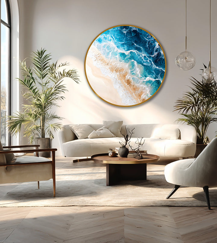 Coastal serenity turquoise ocean wave round oil painting art piece features a stunning beach scene in vibrant blues and tans.