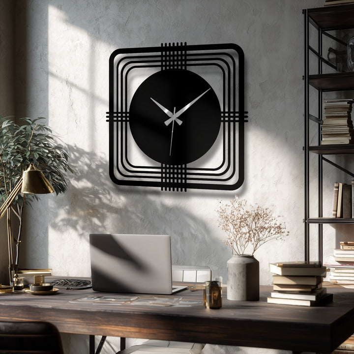 Contrasting shadows accentuate the modern geometric square frame design on this metal art for wall clock, creating subtle shifts between light and dark tones.