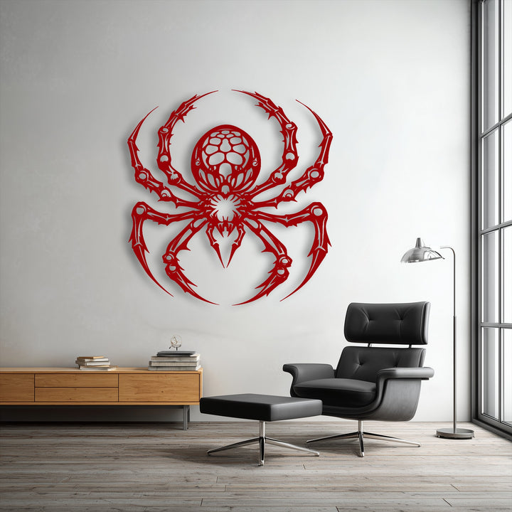 Vertically oriented and intricately shaped Gothic spider metal wall decor with stylized legs and body on a light-colored wall.