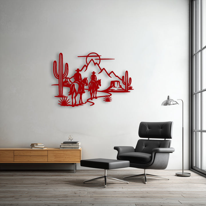Subtle shadows play across the intricate red metal wall decor, highlighting the desert cowboys and mountainous silhouette against the bright white wall.