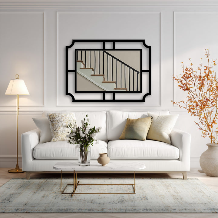 Gentle light graces the room, reflecting off the white sofa and emphasizing the unique metal wall art of the framed geometric wall mirror's minimalist design.