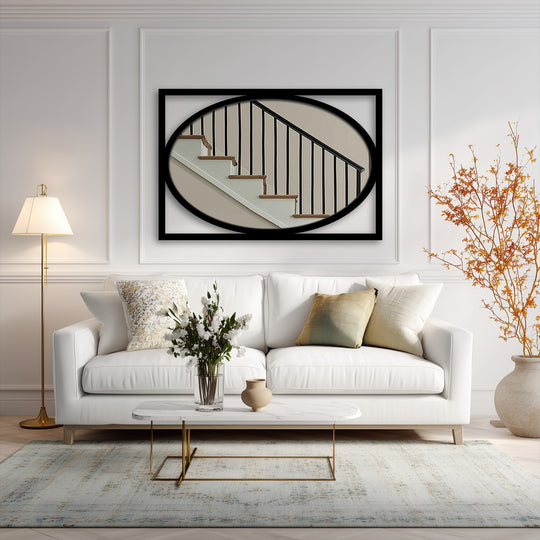 Light and shadow play across the modern oval framed wall mirror, emphasizing the minimalist rectangle accent with an interplay of decorative metal art.