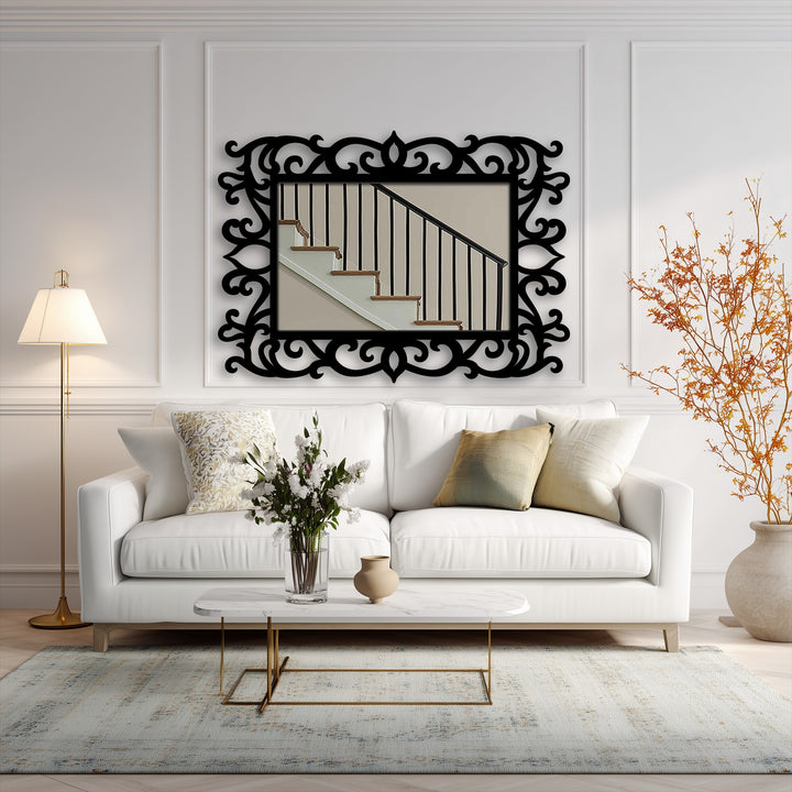 The stillness of the ornate floral scroll frame floor mirror emanates timeless elegance, showcasing black metal artwork with a sophisticated reflection.
