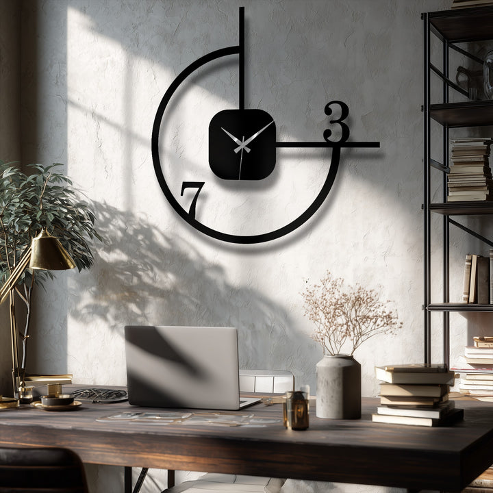 Visual rhythm is created by the interplay of the open circle and linear extensions of this minimalist geometric metal wall clock, offering unique metal wall art.