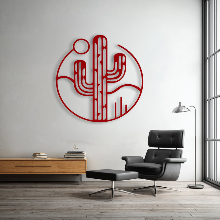 The minimal desert cactus metal artwork showcases striking geometric shapes forming a saguaro, sun, and rolling landscape within a bold circular outline.