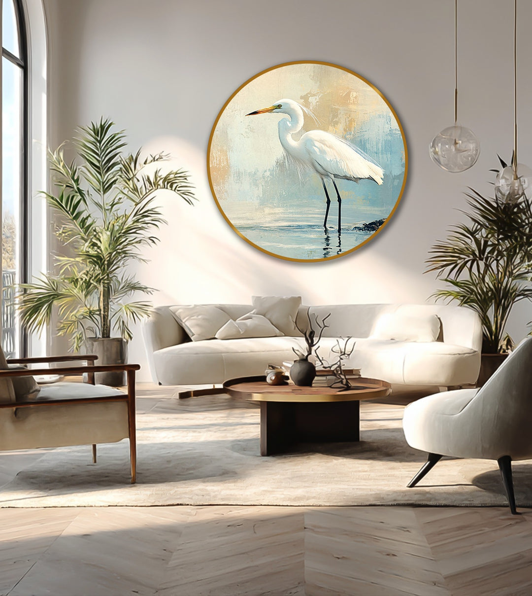 Round coastal oil painting wall art featuring a white egret stands out as the loudest element in the modern, sunlit living room.