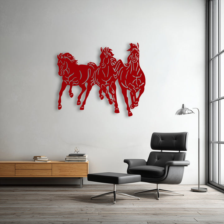 Premium metal artwork featuring a dynamic trio of galloping horses, showcasing intricate cut-out details and a robust finish.