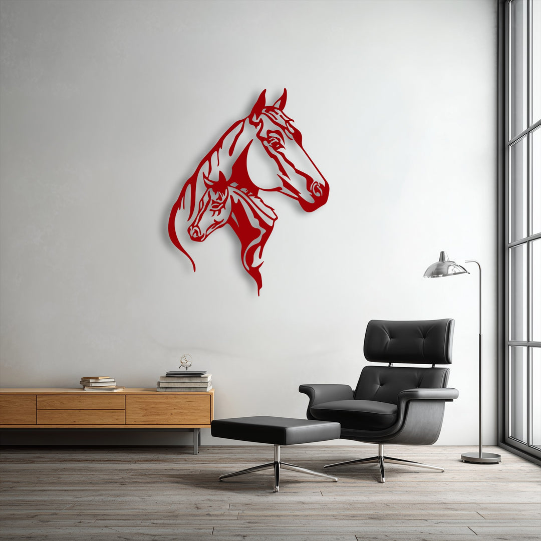 The exquisite material quality of the red dual horse head silhouette metal artwork stands out against the crisp white wall.