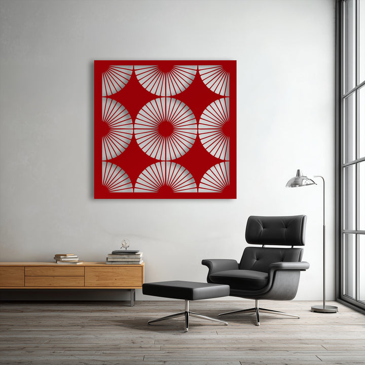 Clean, well-defined edges distinguish the vibrant red geometric fan pattern of this modern metal wall decor.
