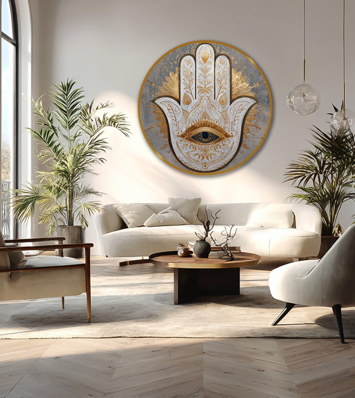 Brightest area highlights the detail in the ornate Sacred Hamsa Eye oil painting reproduction print, a round wooden wall art piece with a golden eye motif.