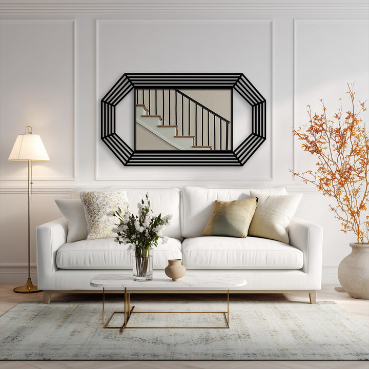 Against the bright white wall, the octagonal mirror for wall decor displays a staircase scene, offering a contrasting focal point within the minimalist setting.