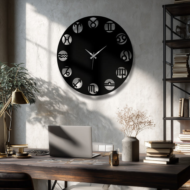 The stark color contrast highlights the dark metal art for wall, a modern zodiac symbol clock against the bright textured wall.