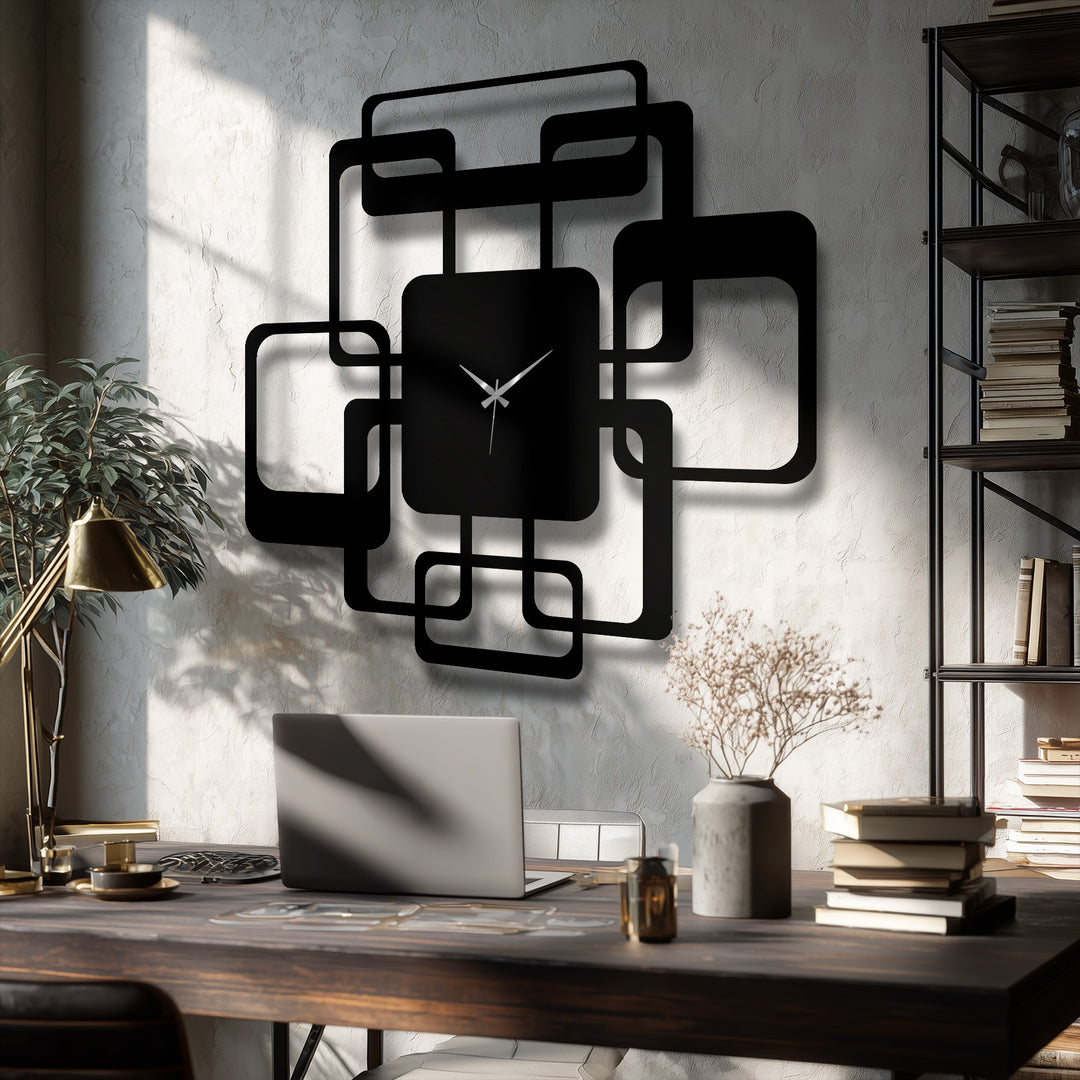 Black is the dominant color in this decorative metal art piece, a modern interlocking squares metal wall clock casting a striking shadow.