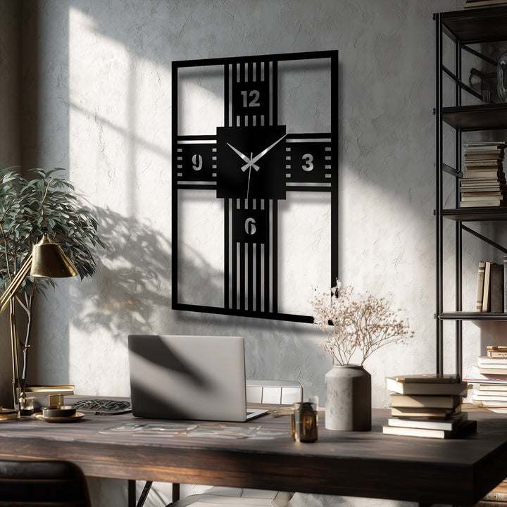 Geometric cross clock displays its unique metal wall art design with prominent numerals, bold lines, and sleek, dark finish against a textured wall.
