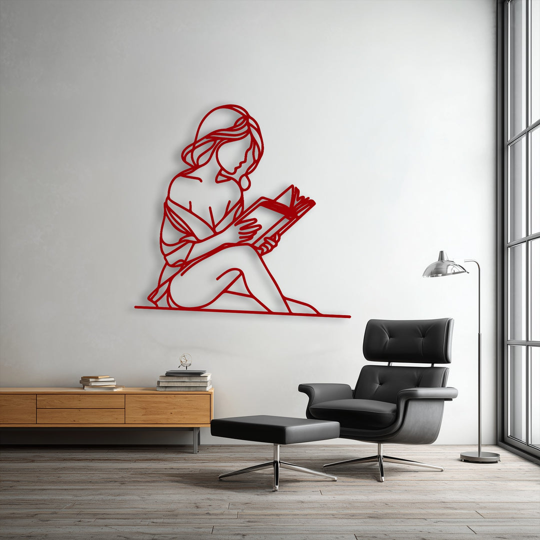 The minimalist reader silhouette metal art for wall projects subtle shadows, adding an intriguing layer of depth against the clean white wall.
