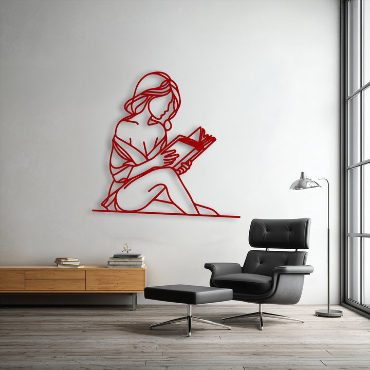 The minimalist reader silhouette metal art for wall projects subtle shadows, adding an intriguing layer of depth against the clean white wall.