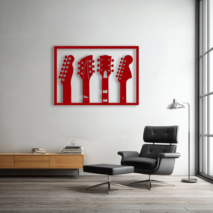 The striking layering effect is prominent in this vibrant red metal art for wall, showcasing four distinct guitar headstock silhouettes.
