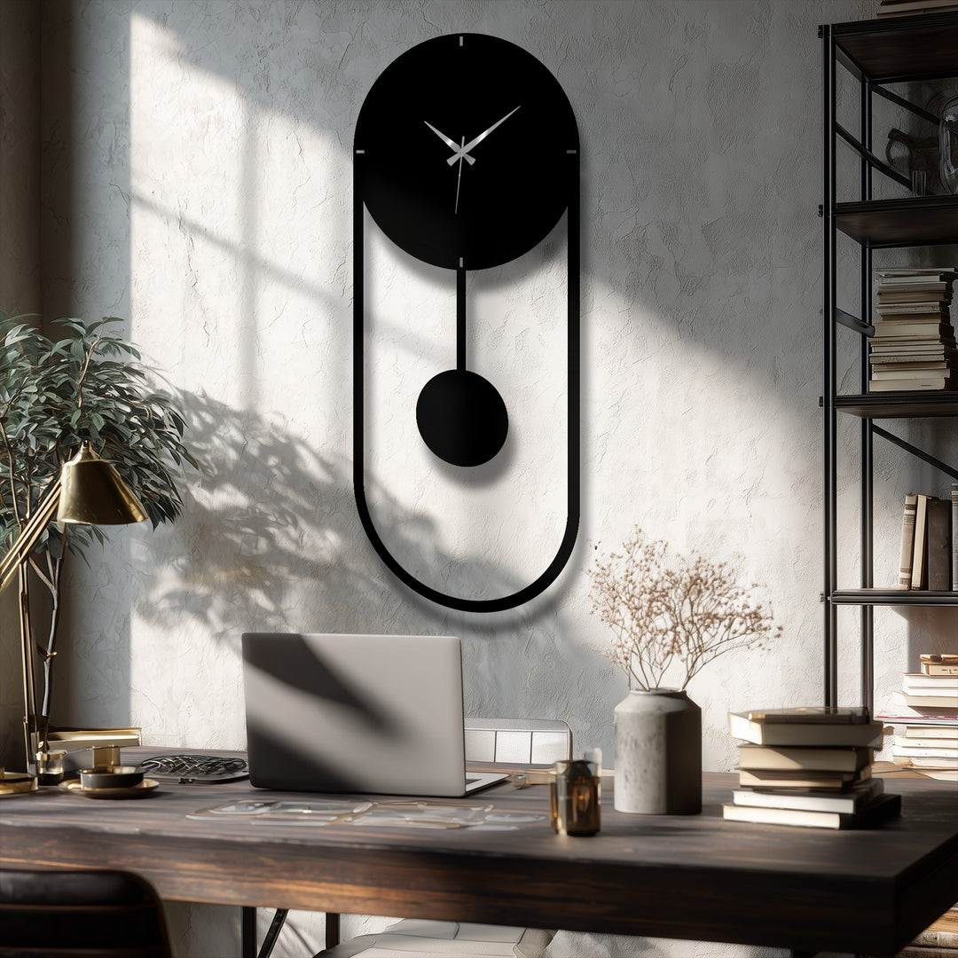 Striking minimalist pendulum metal wall clock adds distinctive metal artwork to the room's home decor, featuring a vertical frame and elegant hands.