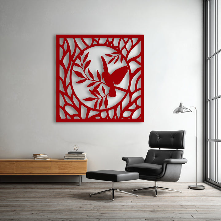 The striking color contrast highlights the vivid red graceful bird in nature circle metal decoration wall art against a crisp, light background.