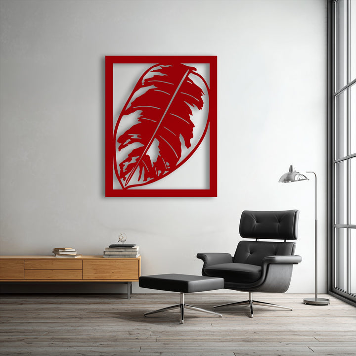 The vibrant matte red finish of the tropical monstera leaf metal art for wall creates a striking focal point with its modern botanical design.
