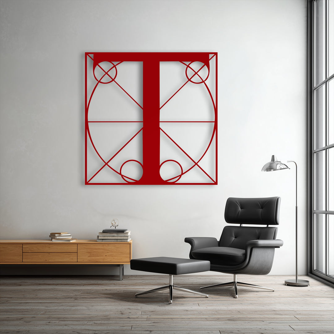 The striking layering effect of the bold red Geometric Letter T decorative metal art stands prominently against the soft white wall.