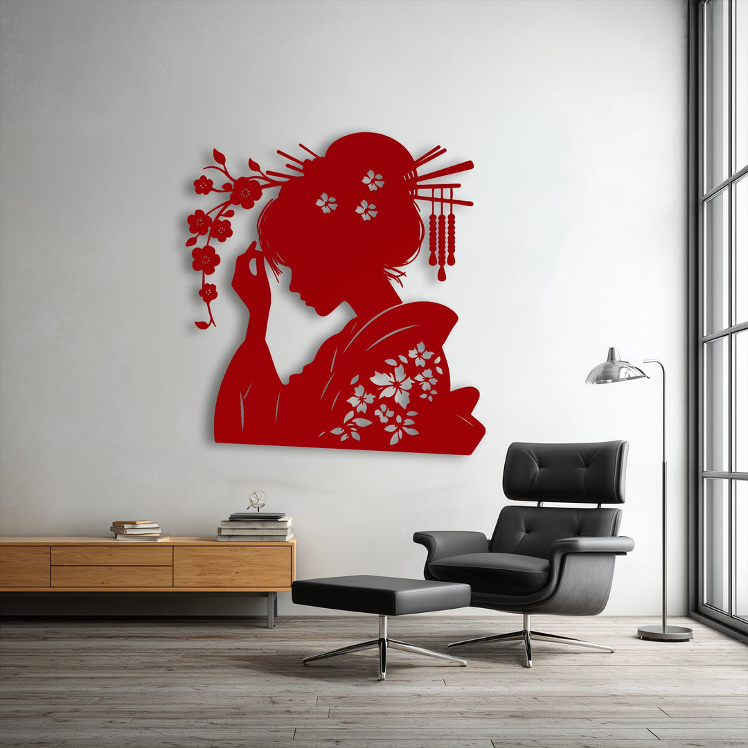 The realistic detail of this decorative metal art highlights an elegant red geisha silhouette with intricate kimono florals and traditional hairpieces.