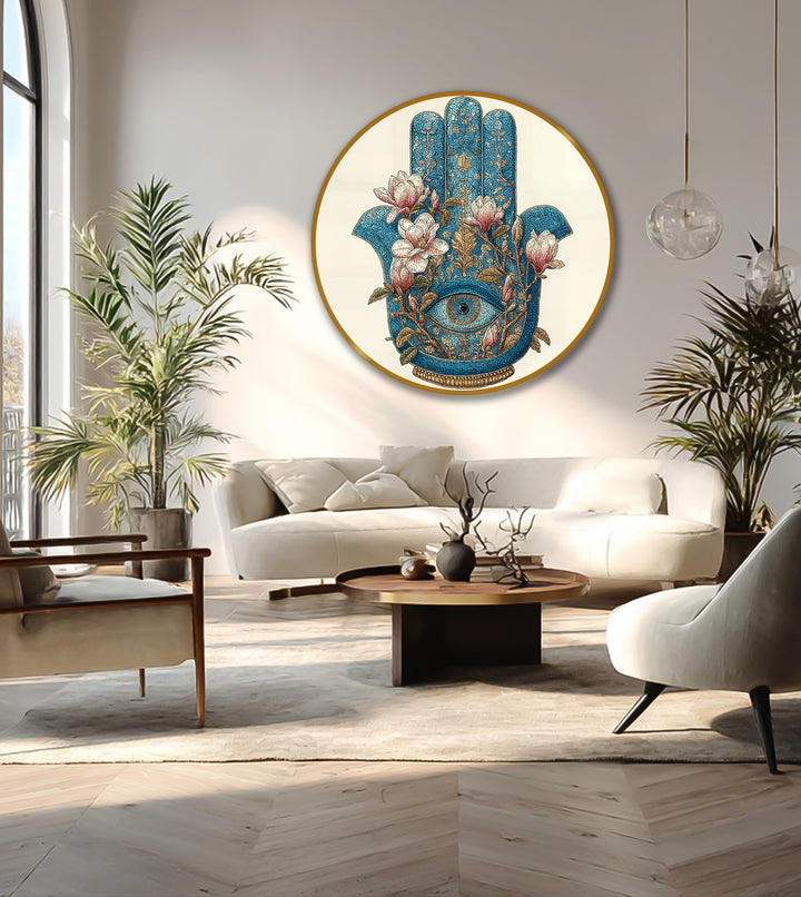 Velvety petals of the painted magnolias highlight the spiritual focus on the protective eye within the Floral Hamsa Eye – Mystical Symbol round oil painting art piece.