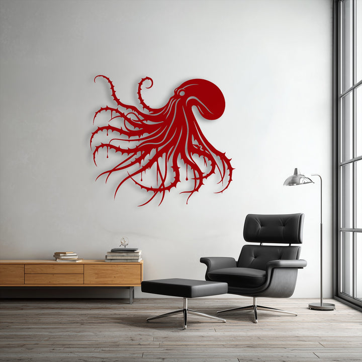 An abstract red octopus metal art for wall with thorny, dripping tentacles creates a striking gothic ocean decor.