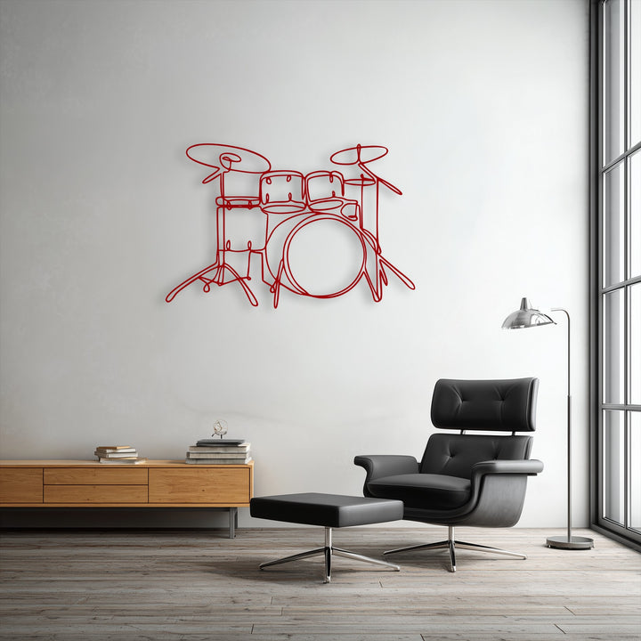 The negative space around the red minimalist drum set line art emphasizes its modern design as unique metal wall art.