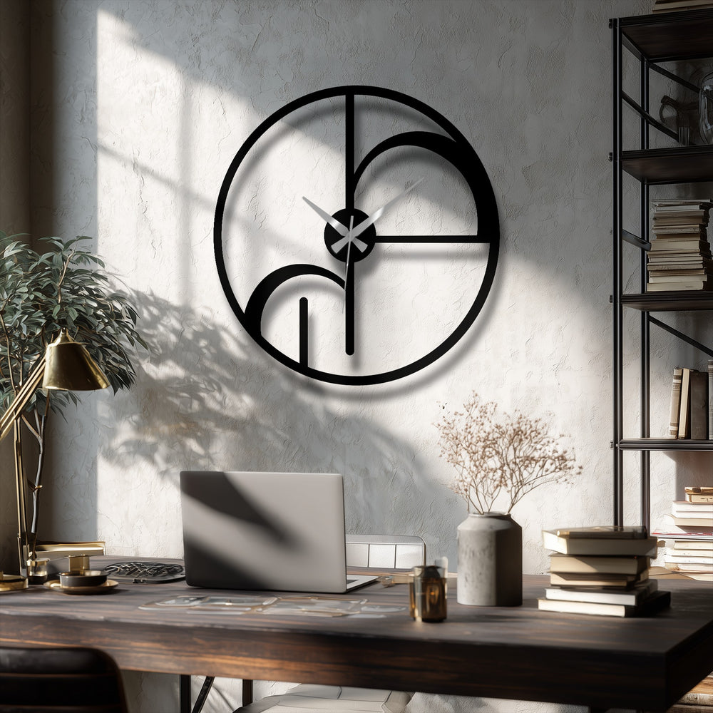 Highlighting the abstract quality, this minimalist metal circle clock showcases geometric shapes, demonstrating innovative metal art for wall decor in a modern arrangement.