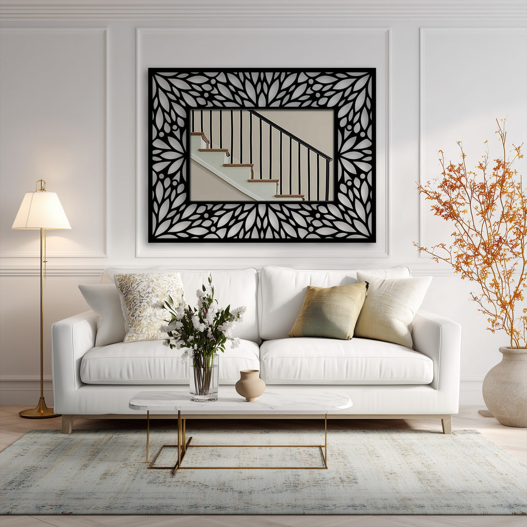 Horizontally oriented and rectangular in shape, this decorative metal art mirror features an intricate floral pattern frame, enhancing its elegant aesthetic.