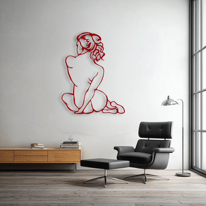 A vertically oriented decoration wall art piece, showcasing the graceful, curvilinear shape of a minimalist female figure in a seated pose.
