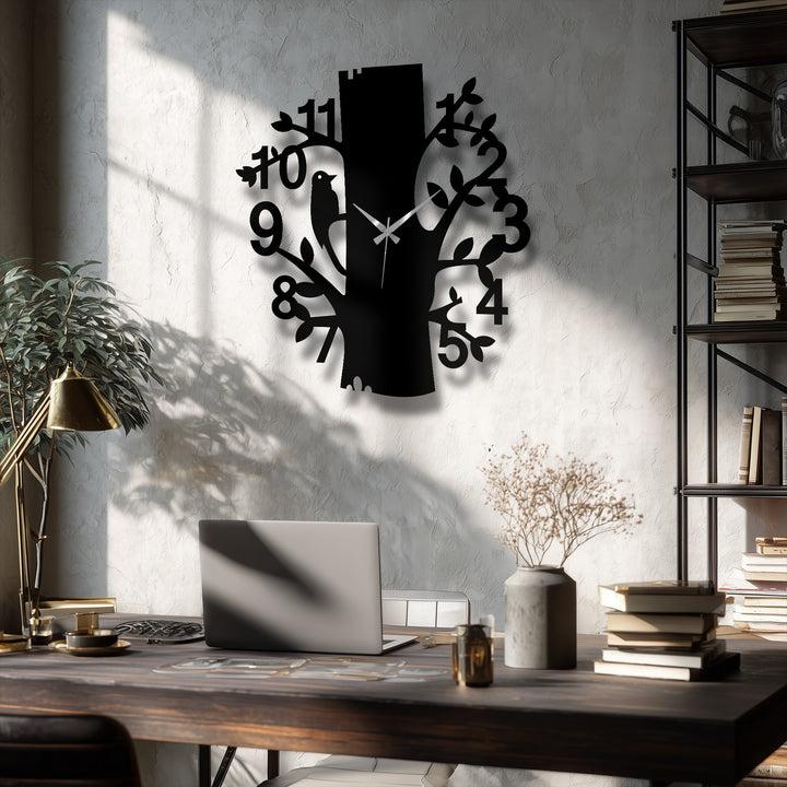 Vertical tree-shaped silhouette displays a modern metal wall clock with unique metal wall art numbers and a bird design, creating a nature-inspired aesthetic.