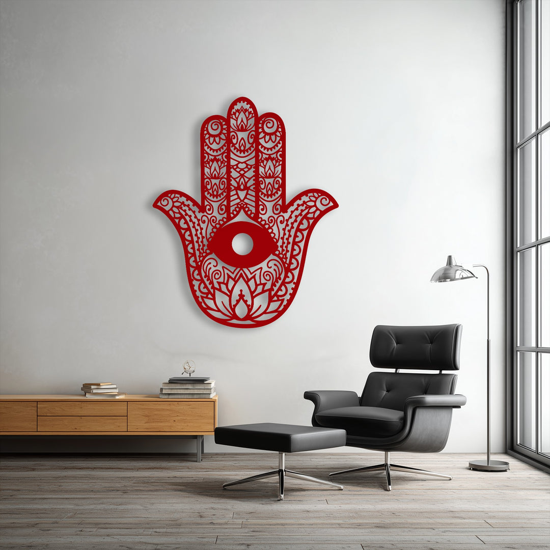 The organic forms of this red Hamsa Hand unique metal wall art, featuring an intricate evil eye design, create a striking focal point.