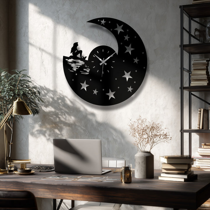 The stillness of the moonlight dream metal art for wall clock captures a celestial night scene with the little mermaid gazing at the starry dial.