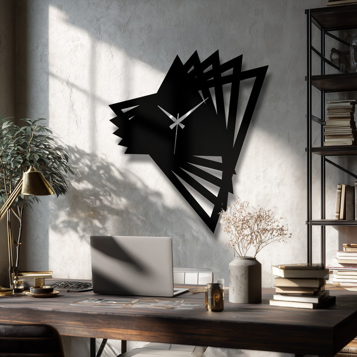 Visual rhythm is achieved in this abstract origami geometric modern metal wall clock using decorative metal art to form a series of triangular shapes.