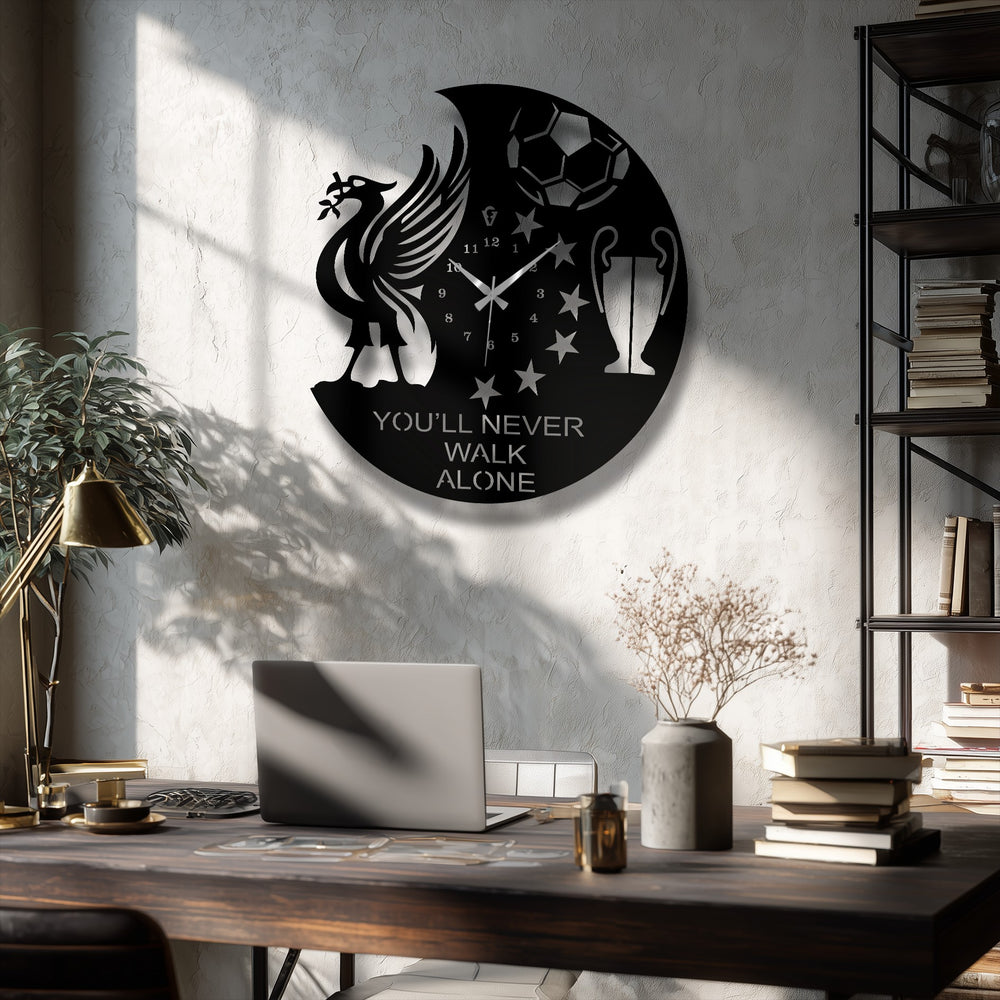 The victory spirit metal art for wall in a football fan design is showcased as the central subject of this unique wall clock featuring a trophy and ball design.