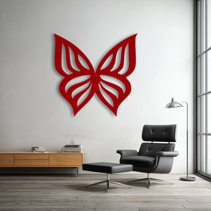 Highly saturated red on the unique metal wall art butterfly dramatically contrasts with the muted, elegant room's natural tones.